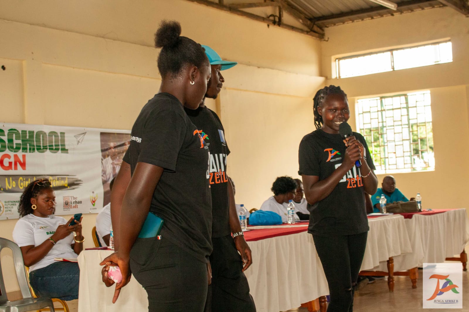 Health worker consulting with an adolescent participant